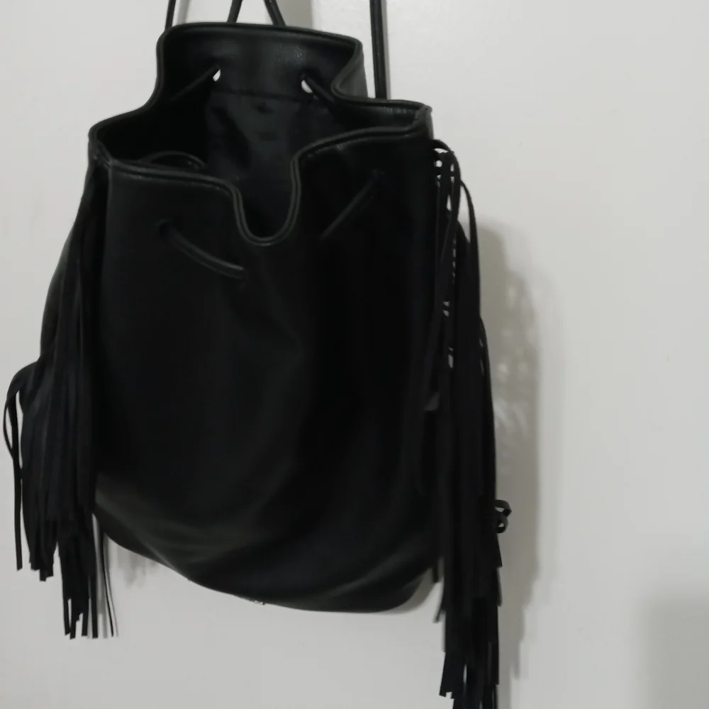 Victoria Secret black Drawstring Backpack With Fringe down both sides